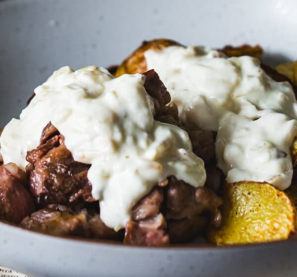 Mogote de Bellota Ibérico FISAN con salsa de pecorino y patatas al horno